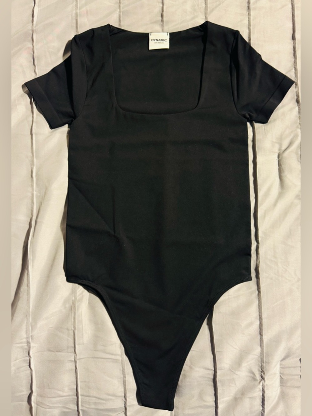 Dynamic Black One-Piece Bodysuit